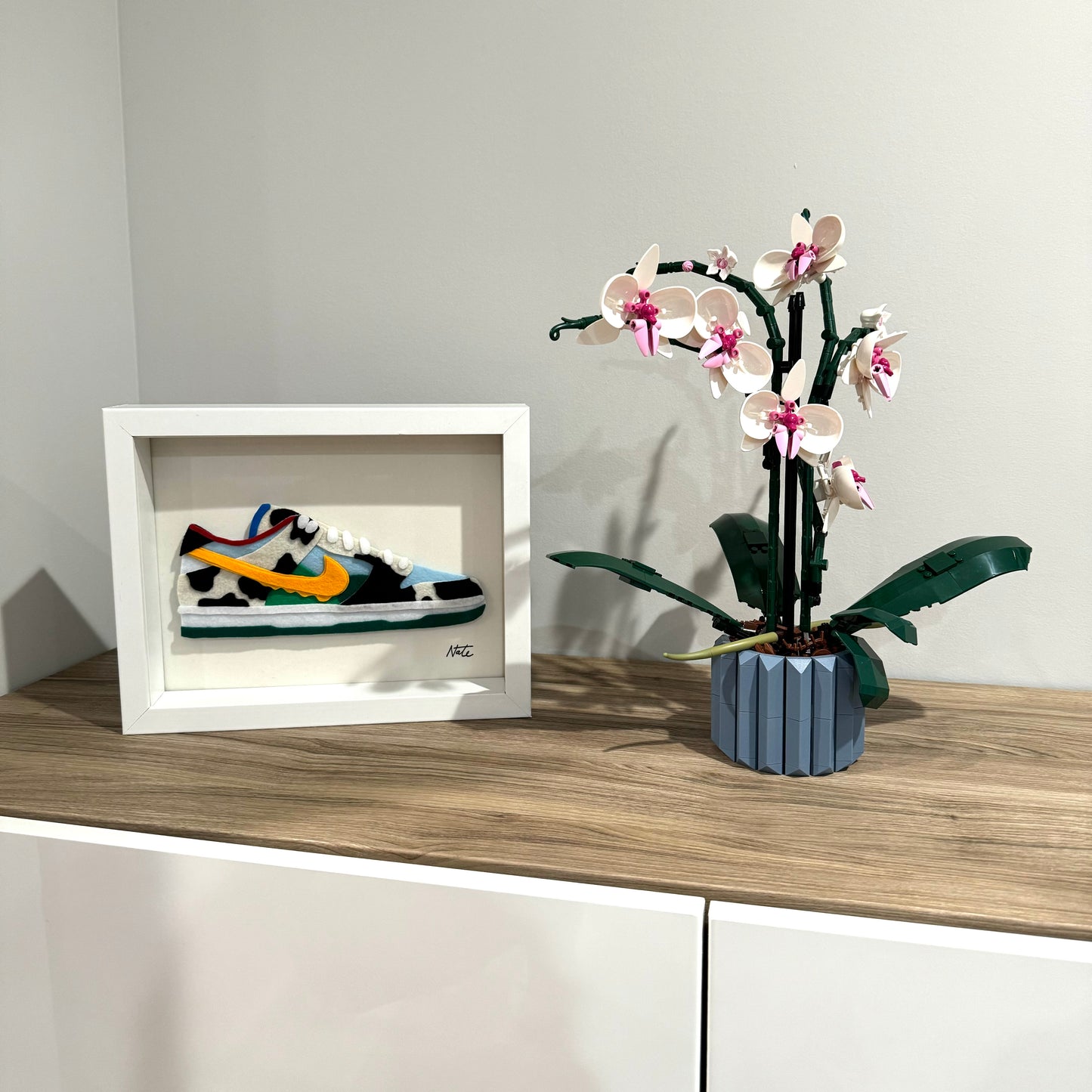 Handmade felt sneaker art in multicolor ice cream-inspired colorway, framed