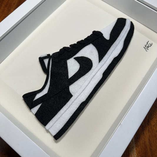 Handmade felt sneaker art in black and white low-top colorway, framed