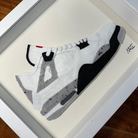 Handmade felt sneaker art in black and white mid-top colorway, framed