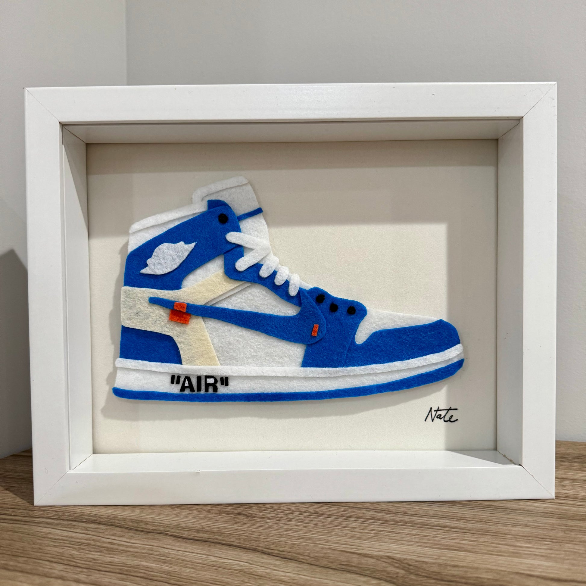 Handmade felt sneaker art in blue high-top remix colorway, framed