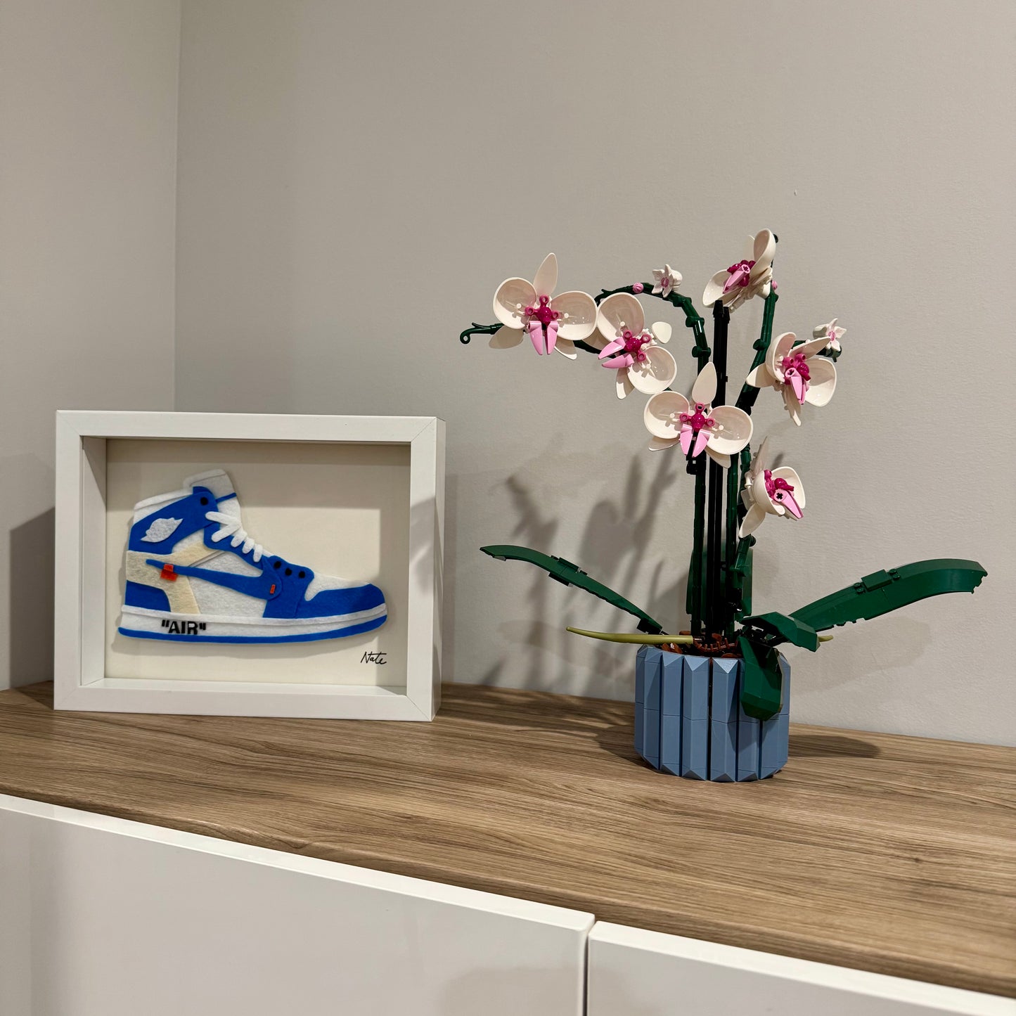 Handmade felt sneaker art in blue high-top remix colorway, framed