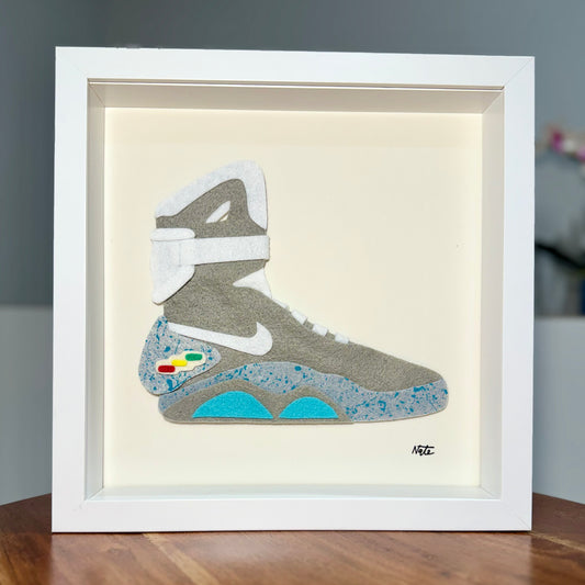 Handmade felt sneaker art in futuristic high-top colorway, framed