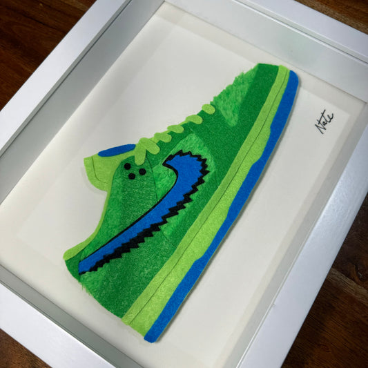 Handmade felt sneaker art with green bear faux fur accents, framed