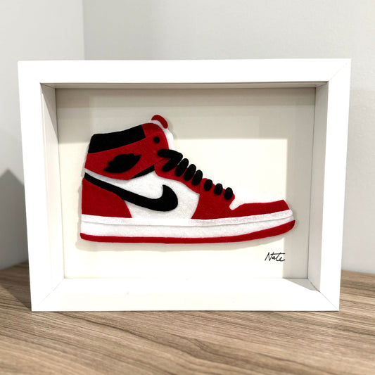 Handmade felt sneaker art in red and black high-top colorway, framed