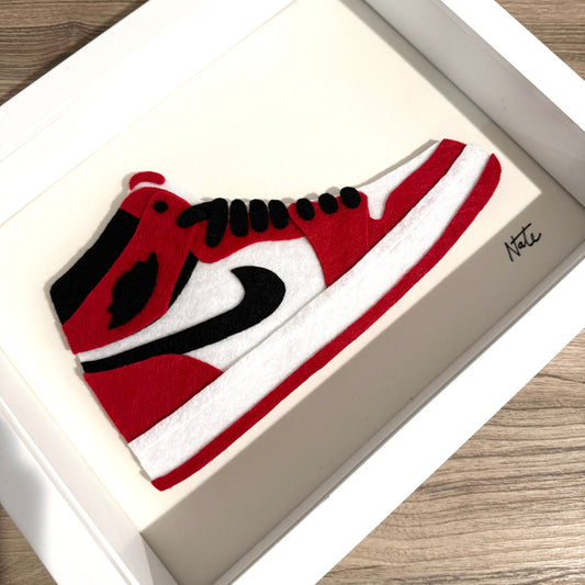 Handmade felt sneaker art in red and black high-top colorway, framed