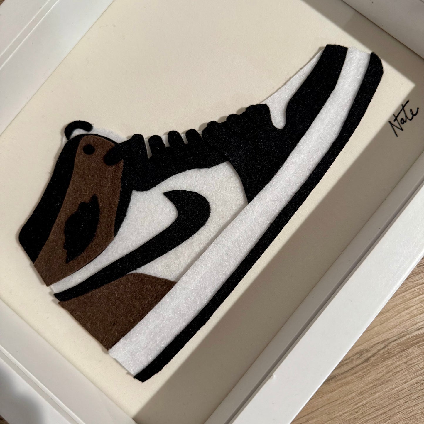 Handmade felt sneaker art in mocha high-top colorway, framed