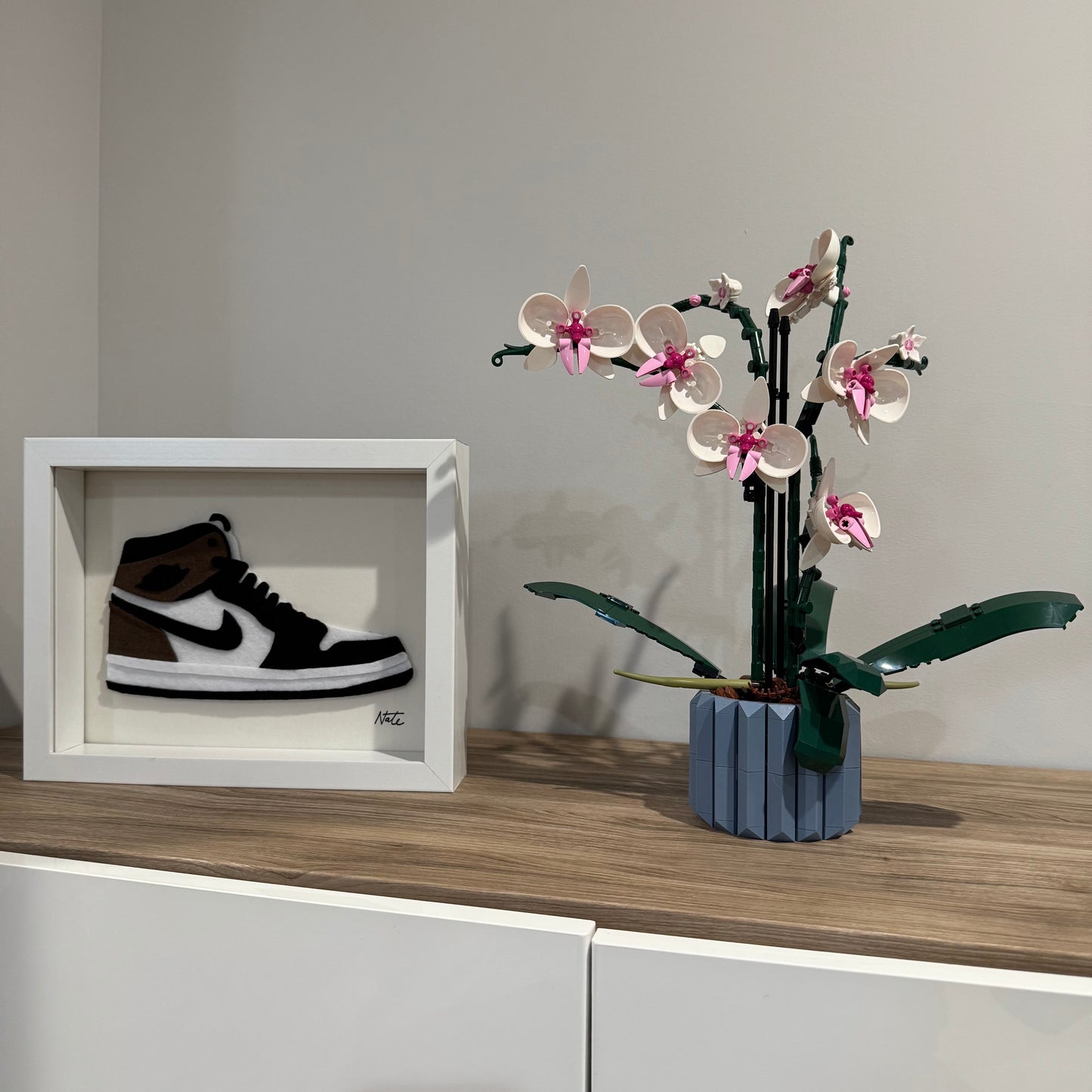 Handmade felt sneaker art in mocha high-top colorway, framed