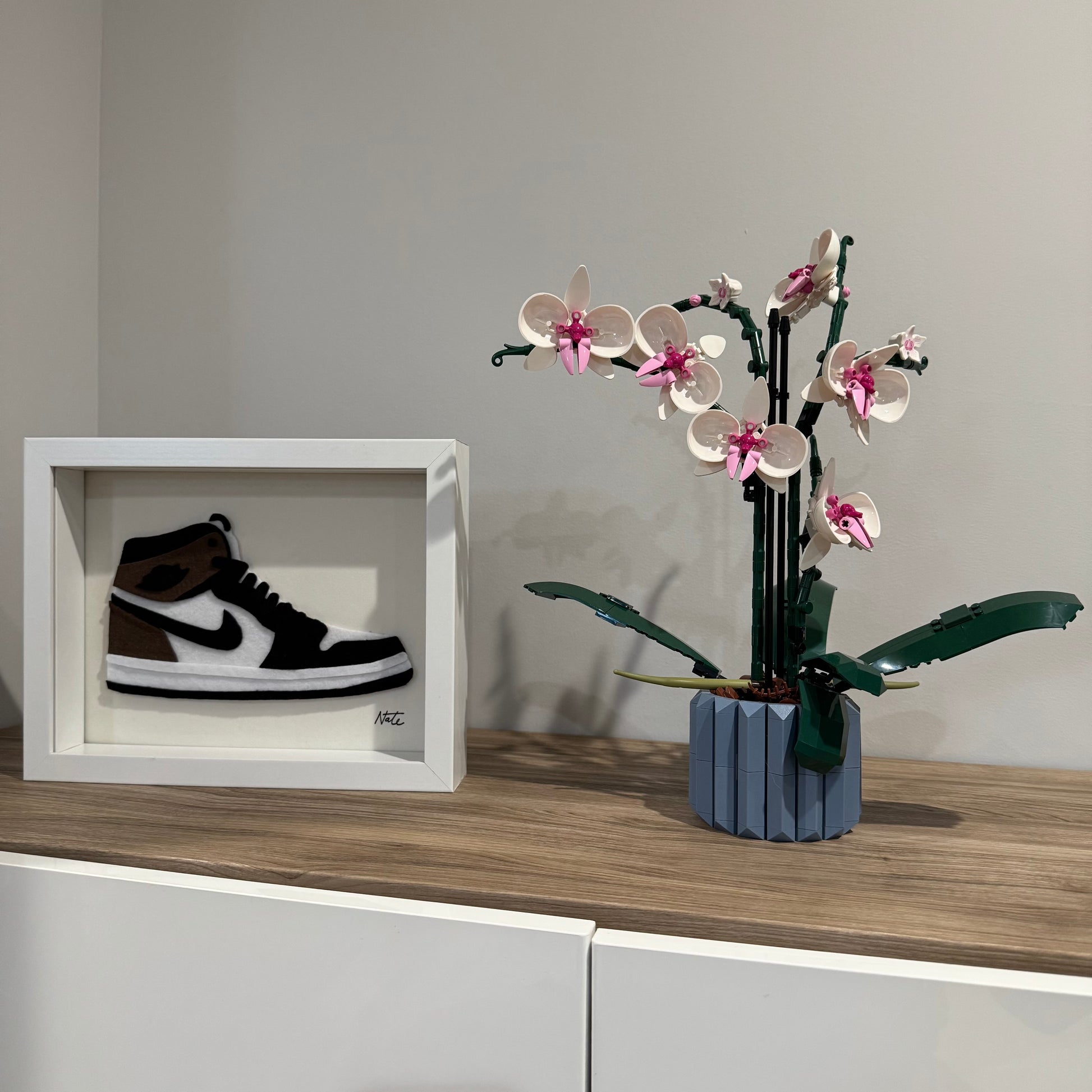 Handmade felt sneaker art in mocha high-top colorway, framed