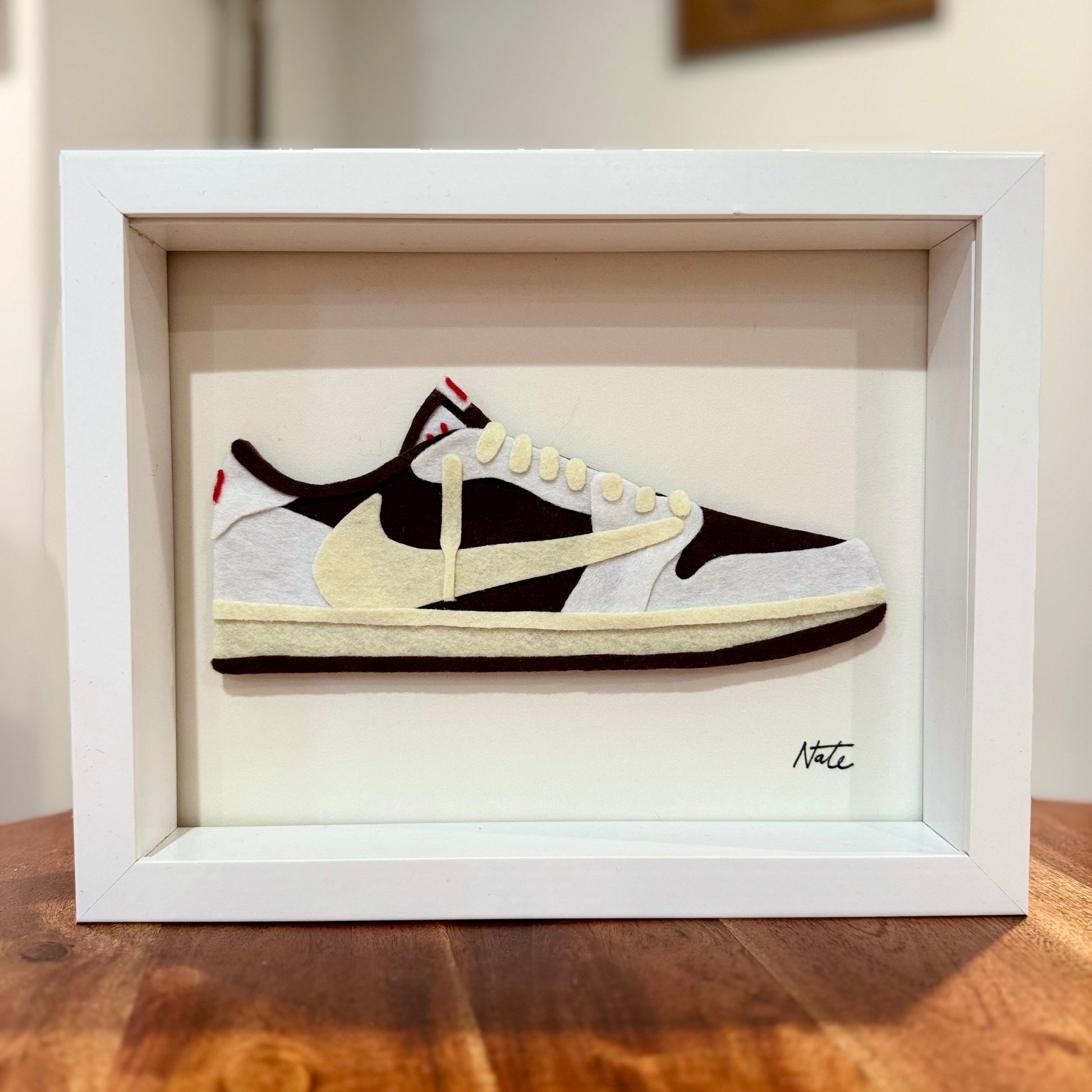 Handmade felt sneaker art in mocha low-top colorway, framed